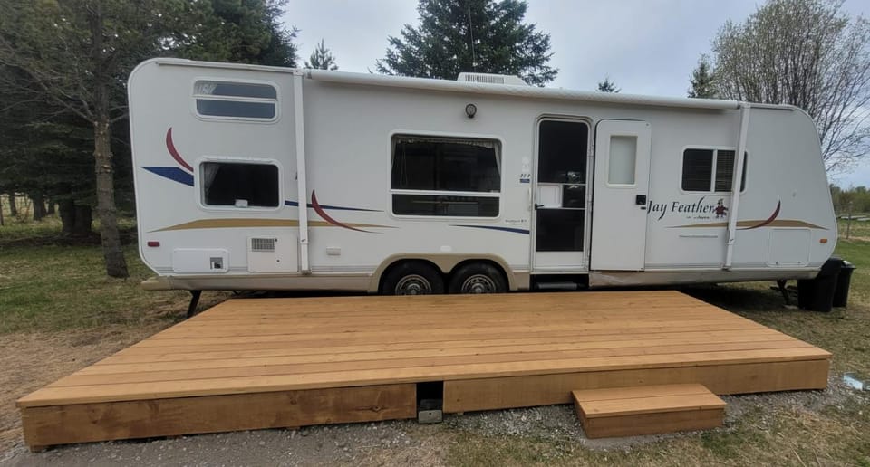 RV with Rocky Mountains View Campground/ 
RV Resort in British Columbia