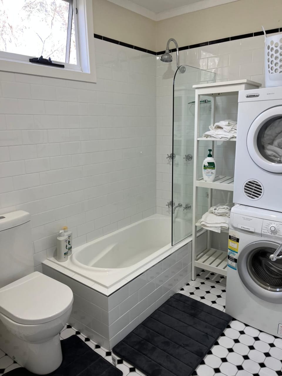 Shower, Toilet, Bathroom, towels, washing machine, dryer