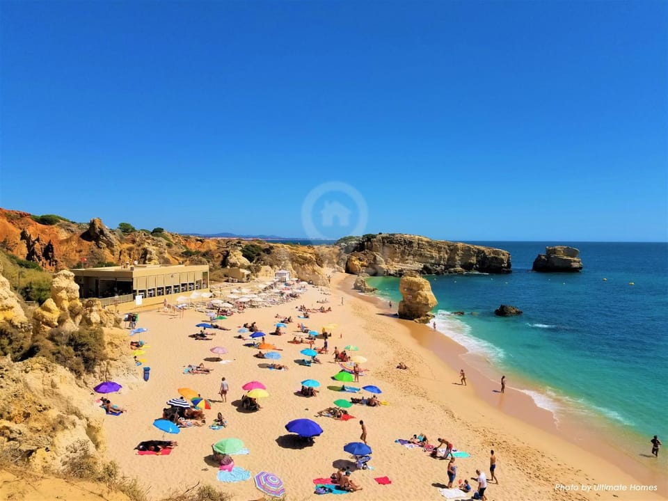 Nearby landmark, People, Natural landscape, Beach