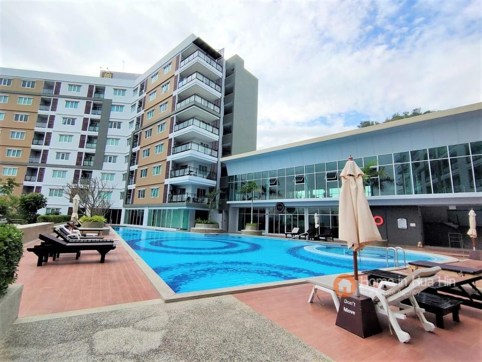 Property building, Pool view, Swimming pool, sunbed