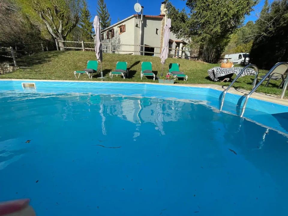 Property building, Living room, Swimming pool