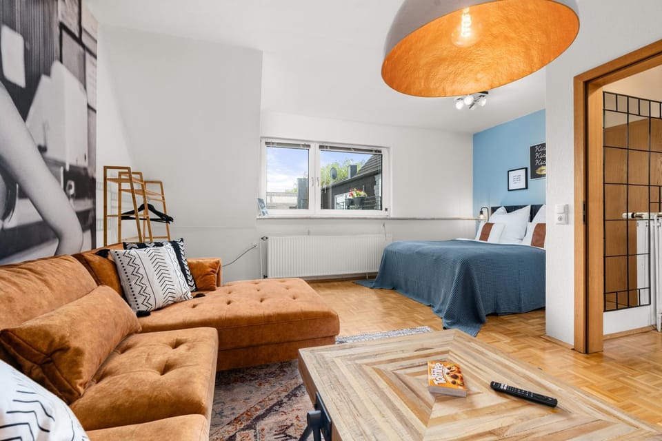 Bed, Living room, Seating area, Bedroom