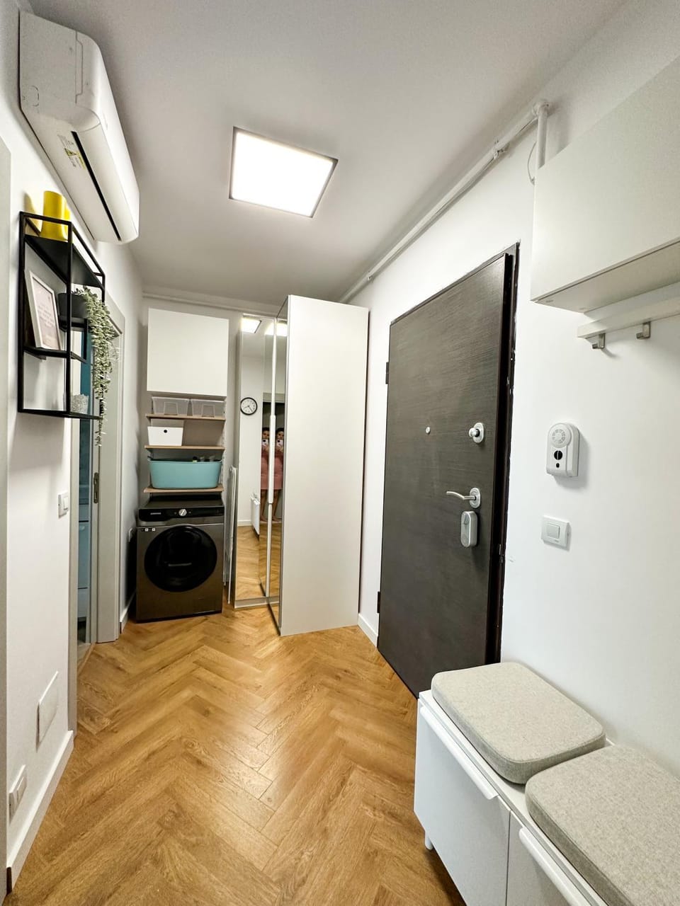Photo of the whole room, wardrobe, washing machine, dryer