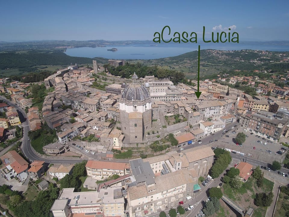 Nearby landmark, Day, Neighbourhood, Natural landscape, Bird's eye view, Text overlay, City view, Landmark view, Sea view