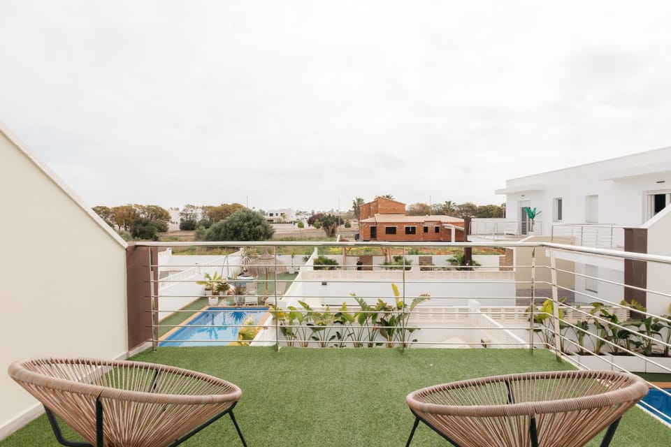 Property building, Patio, Day, Garden, View (from property/room), Balcony/Terrace, Garden view, Pool view, Swimming pool