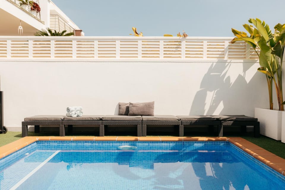 Patio, Day, Seating area, Pool view, Swimming pool, sunbed