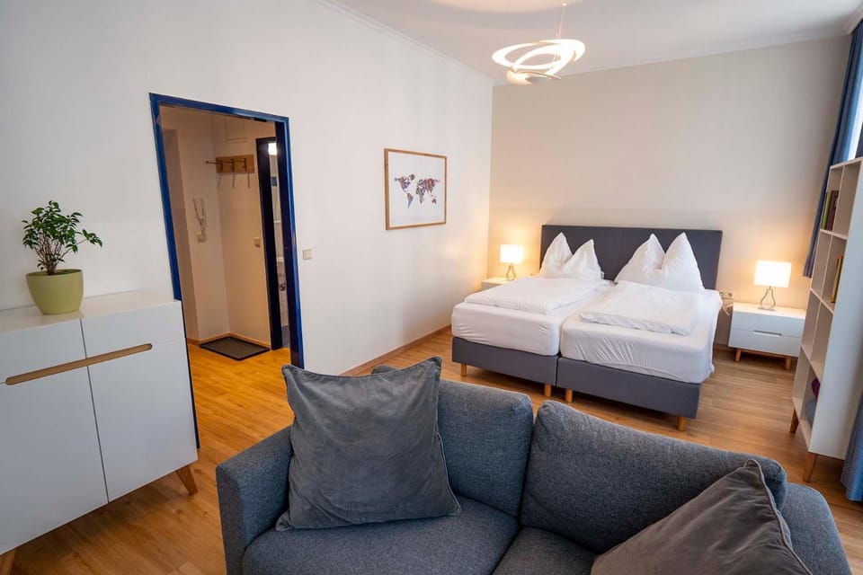Bed, Living room, Seating area, Bedroom