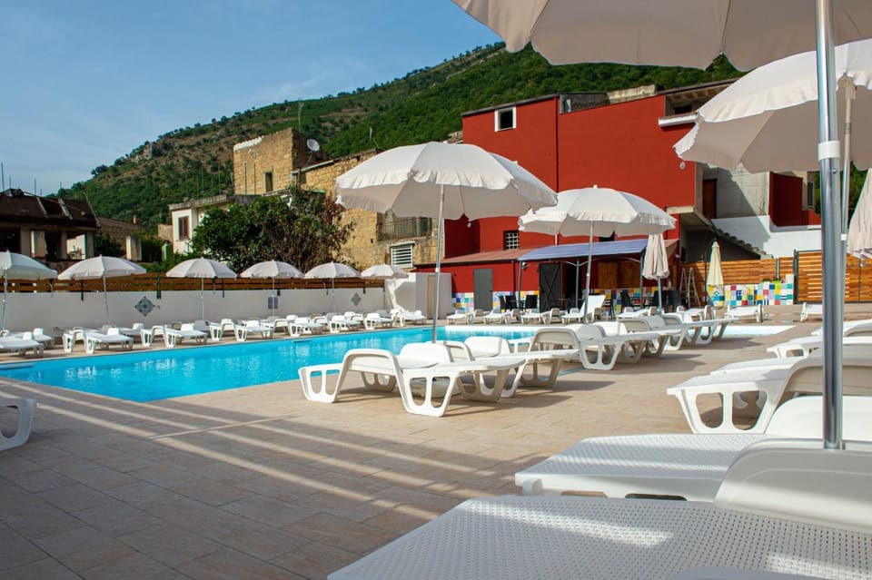 Property building, Day, Pool view, Swimming pool, sunbed, Internal: Not applicable to any particular room