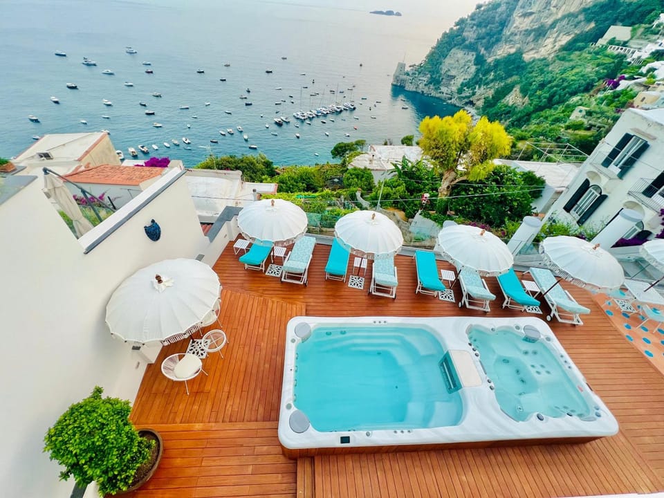 Property building, Natural landscape, Beach, Sea view, sunbed