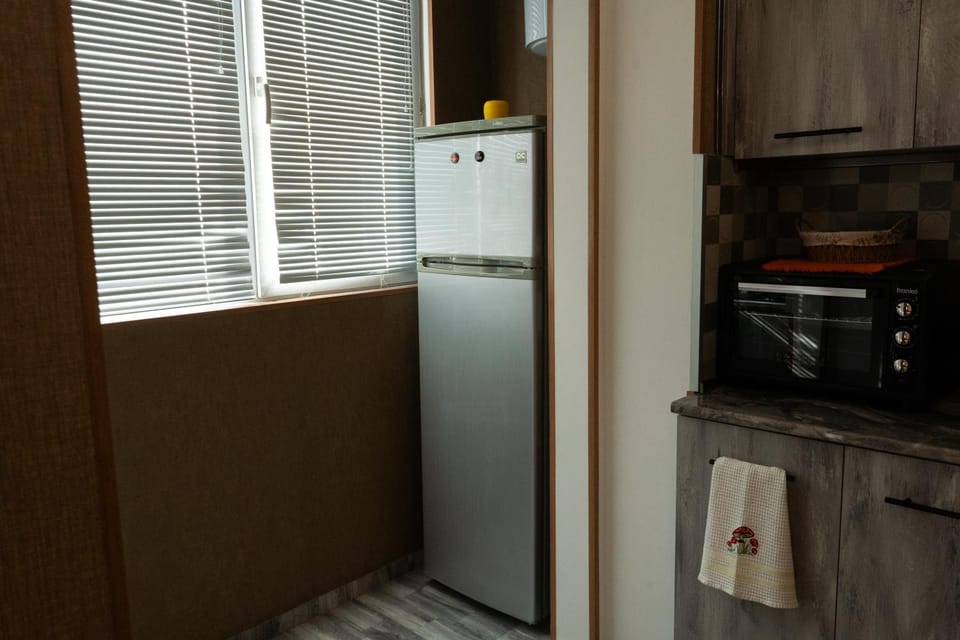 Kitchen or kitchenette, oven