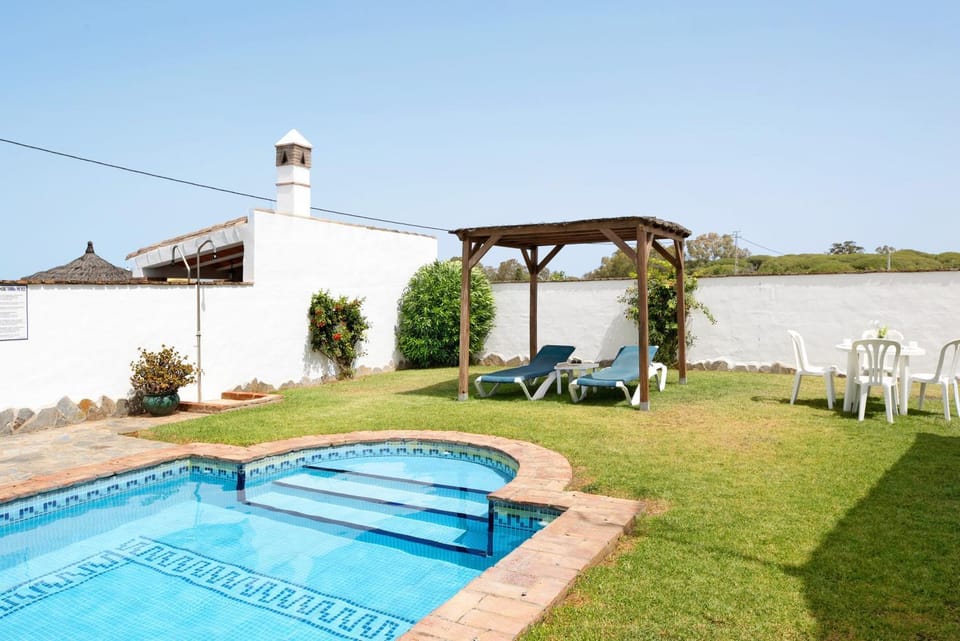 Property building, Living room, Swimming pool