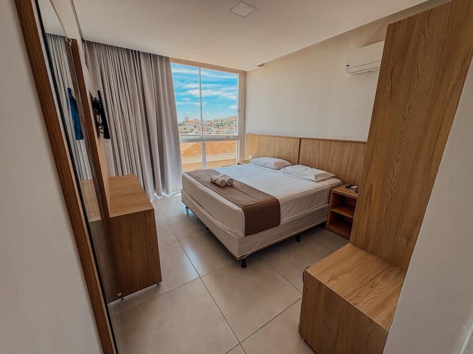 Bed, Photo of the whole room, towels, wardrobe, air conditioner