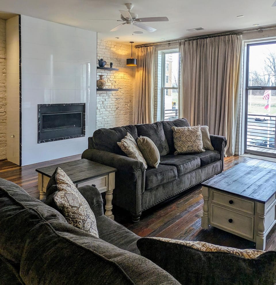 Living room, Seating area, City view, fireplace, flat iron