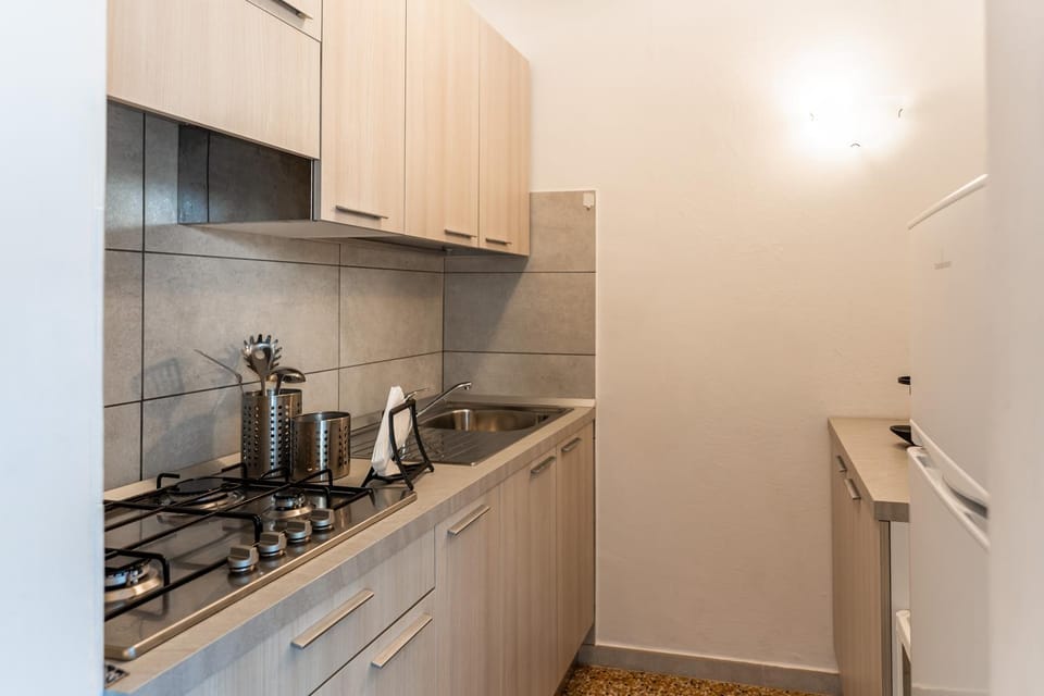 Kitchen or kitchenette, stove