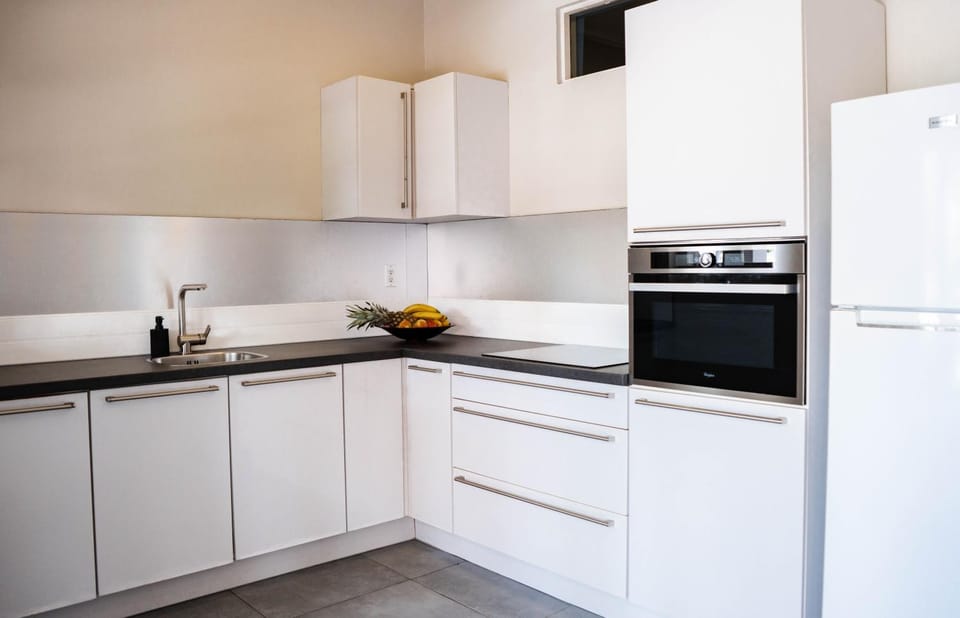 Kitchen or kitchenette, oven, stove