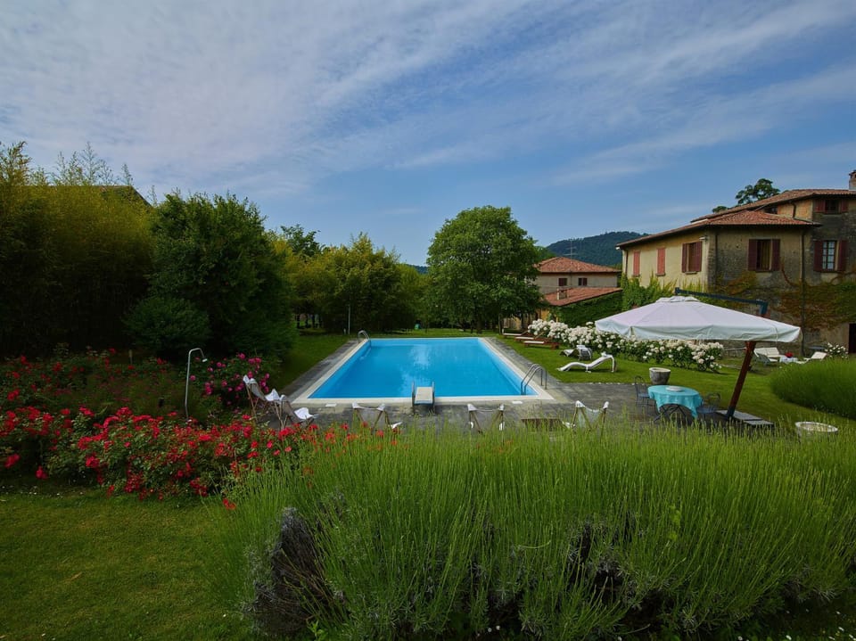 Property building, Day, Natural landscape, Garden, Garden view, Pool view, Swimming pool, sunbed