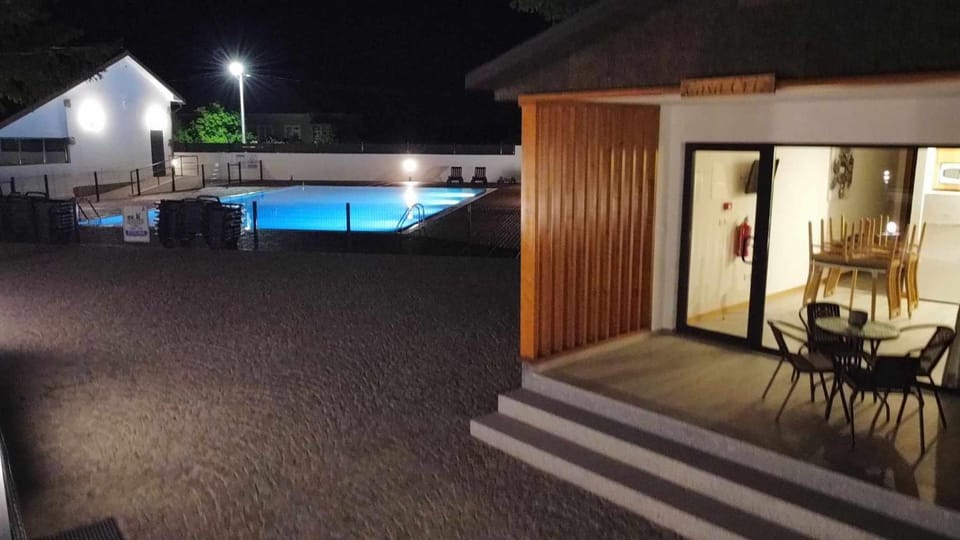 Property building, Patio, Night, Swimming pool