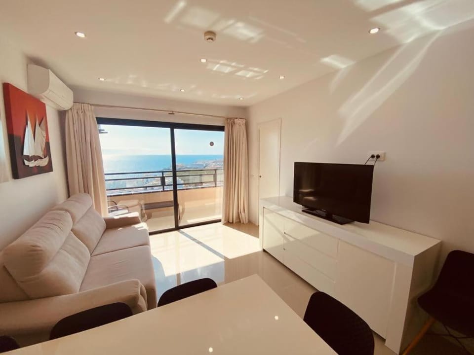 TV and multimedia, Living room, Photo of the whole room, Seating area, Sea view, air conditioner