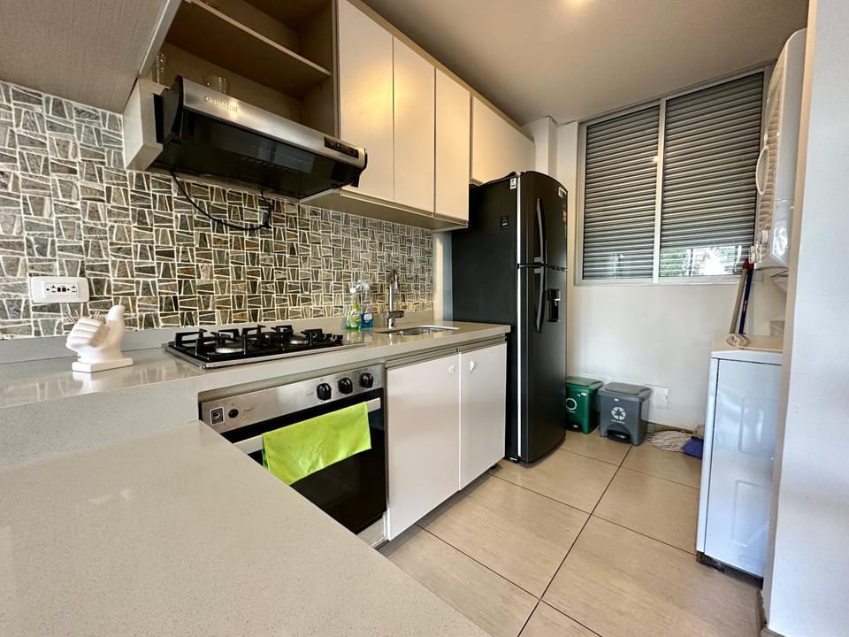 Kitchen or kitchenette, oven, stove, washing machine, dryer, kitchen