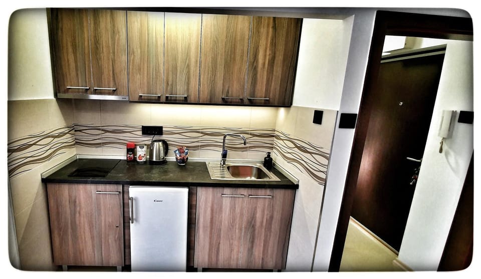 Kitchen or kitchenette, stove