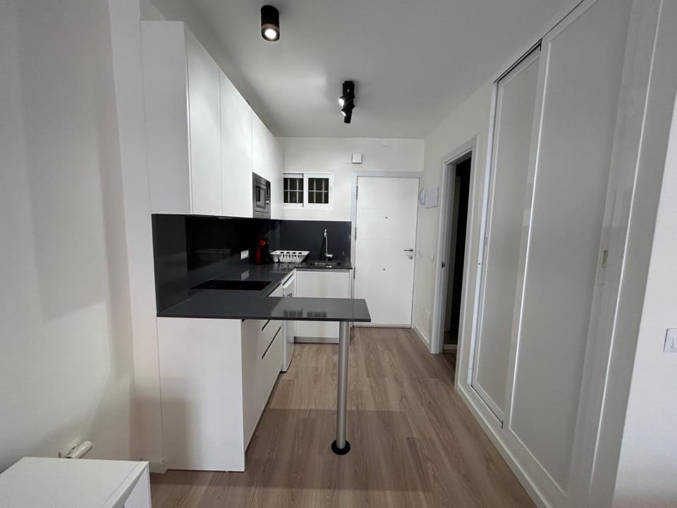 Kitchen or kitchenette, stove