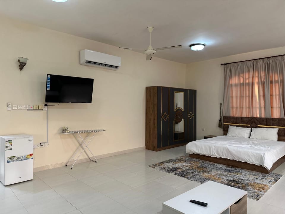 Bed, TV and multimedia, Bedroom, flat iron, wardrobe, air conditioner
