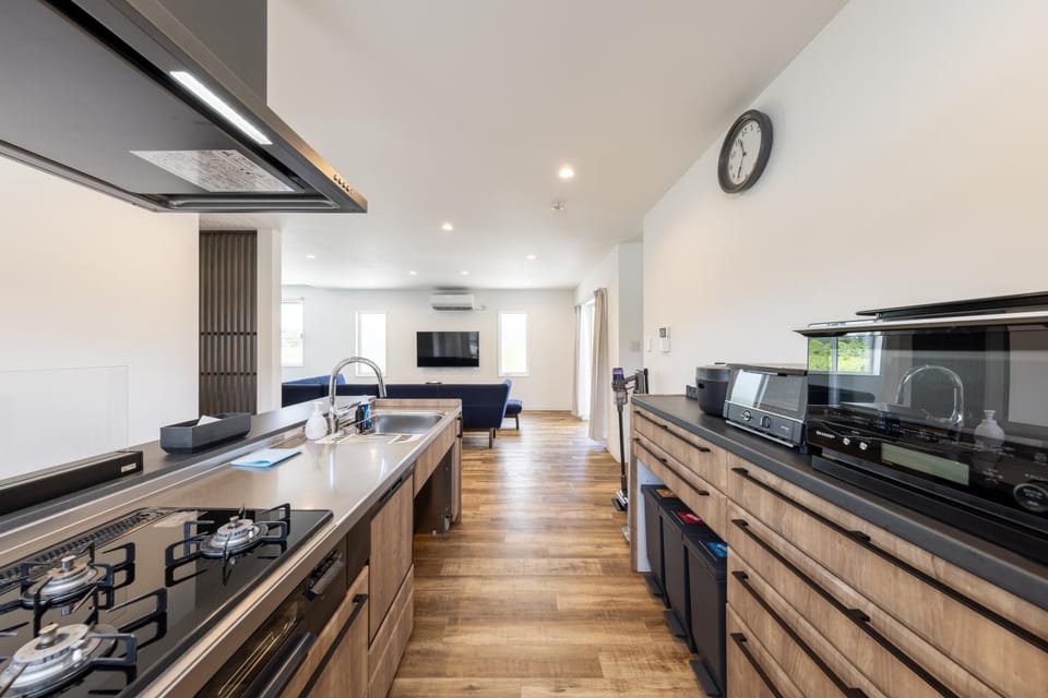 Kitchen or kitchenette, dishwasher, microwave, stove