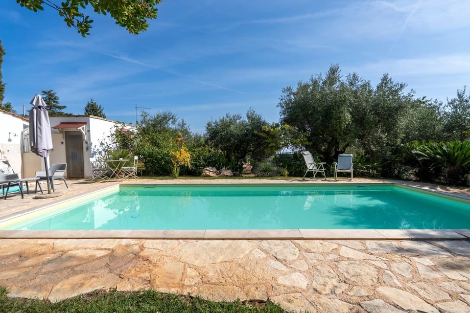 Property building, Living room, Swimming pool