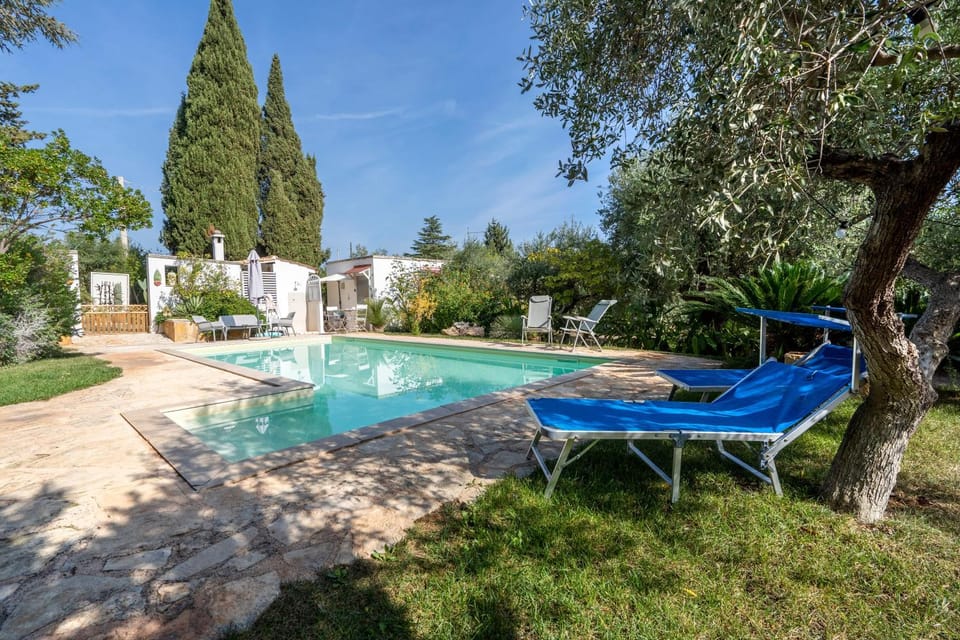Property building, Living room, Swimming pool