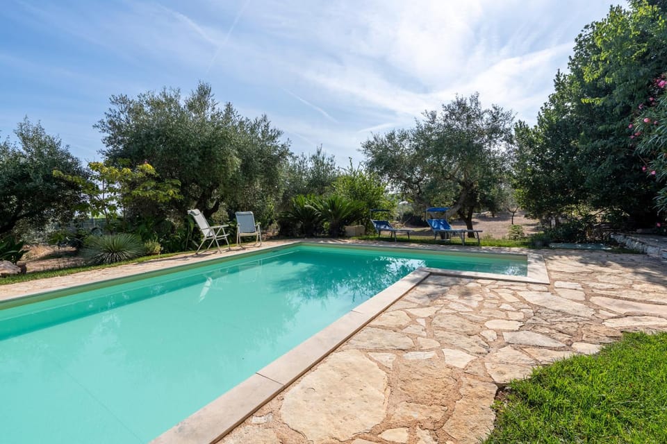 Property building, Living room, Swimming pool