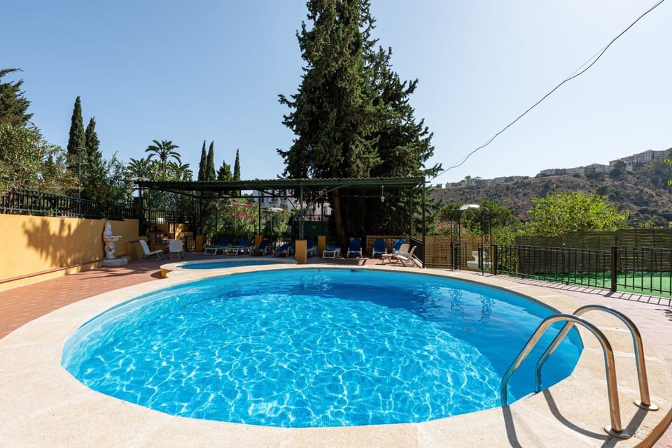 Property building, Living room, Swimming pool