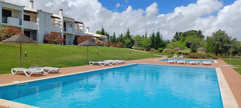 Swimming pool, sunbed