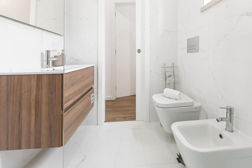 Bathroom, bidet, towels