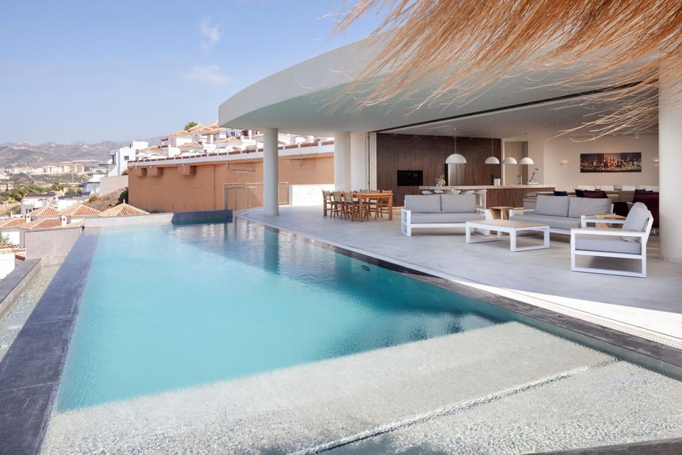 Property building, Living room, Swimming pool