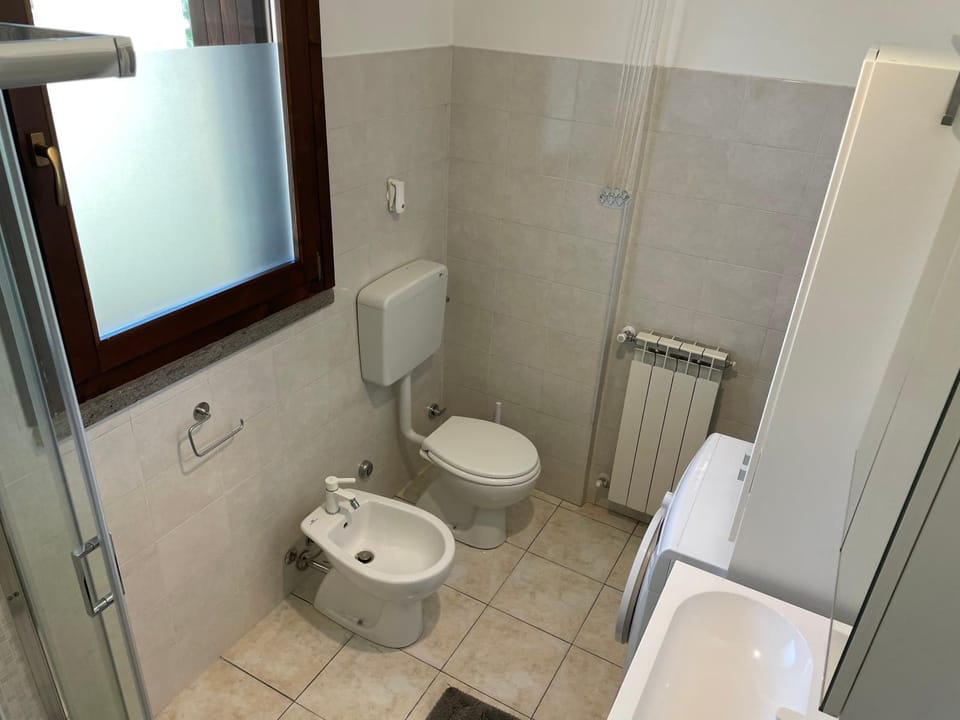 Bathroom, bidet, washing machine