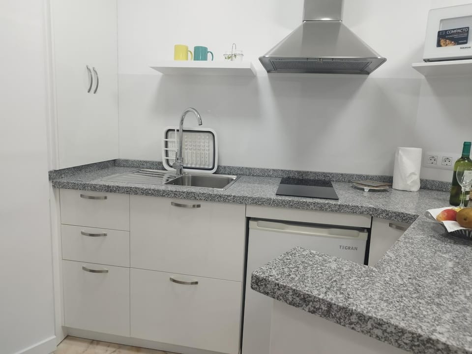 Kitchen or kitchenette, stove
