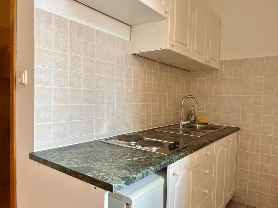 Kitchen or kitchenette, stove