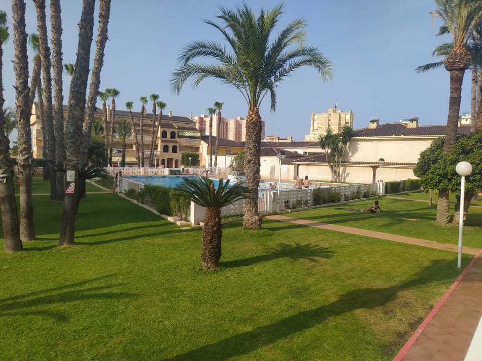 Property building, Spring, Day, Natural landscape, Swimming pool