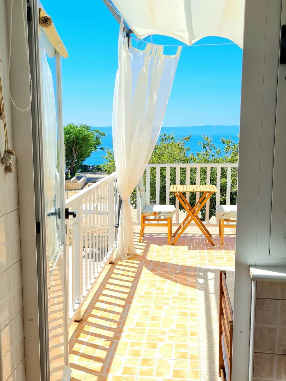 View (from property/room), Balcony/Terrace, Seating area, Sea view