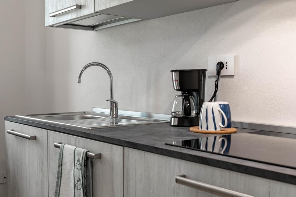 Kitchen or kitchenette, stove, kitchen