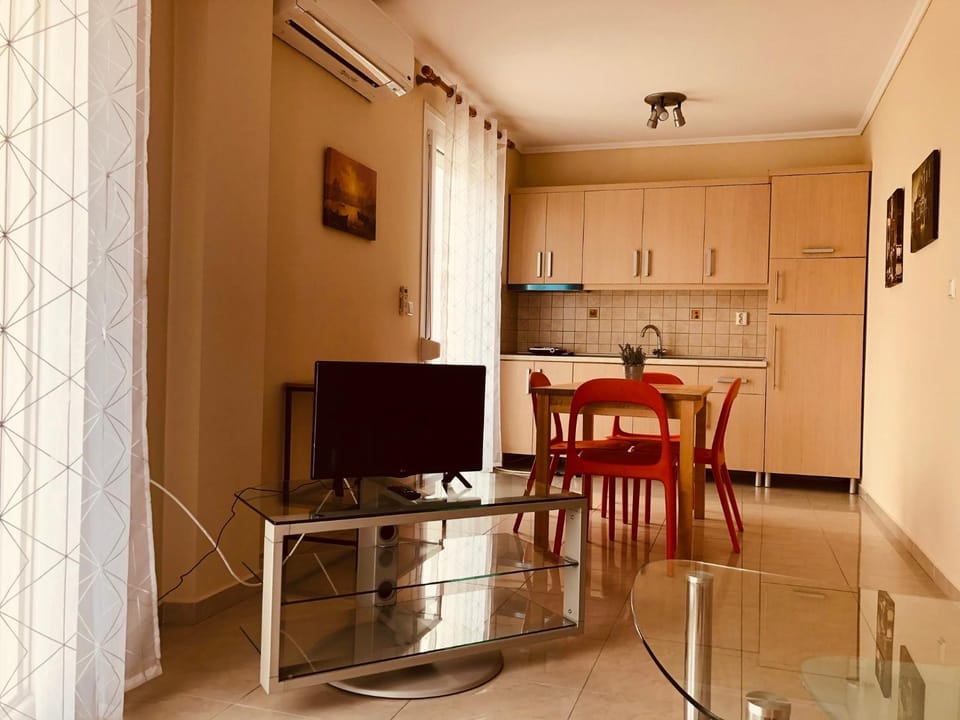 Kitchen or kitchenette, Living room, Seating area, Dining area, stove, air conditioner