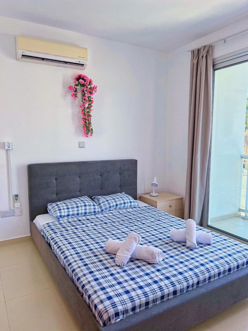 Bed, Photo of the whole room, Bedroom, towels, air conditioner