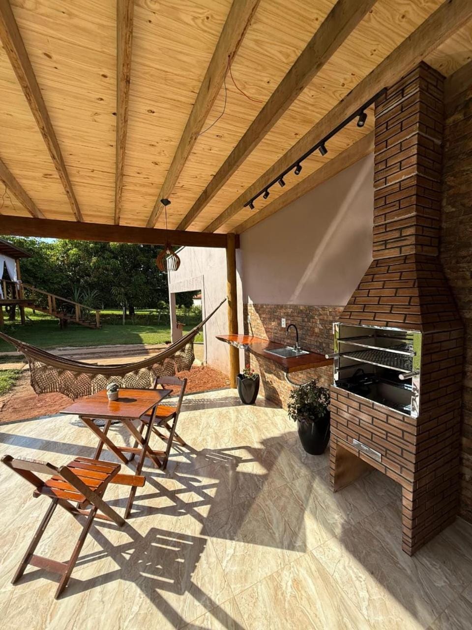Patio, Day, BBQ facilities, Dining area