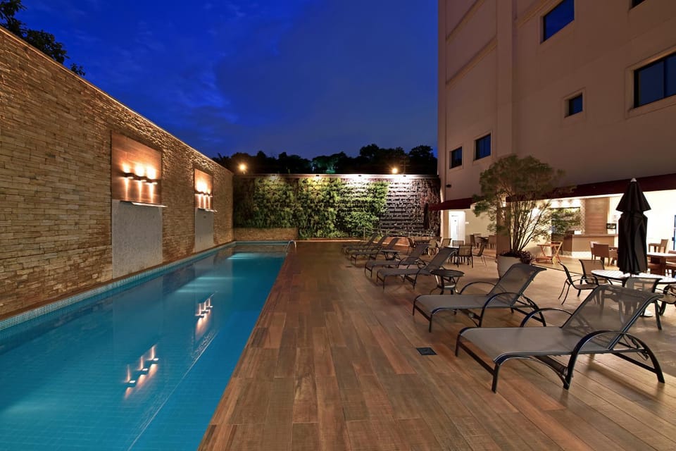 Night, Balcony/Terrace, Pool view, Swimming pool, sunbed