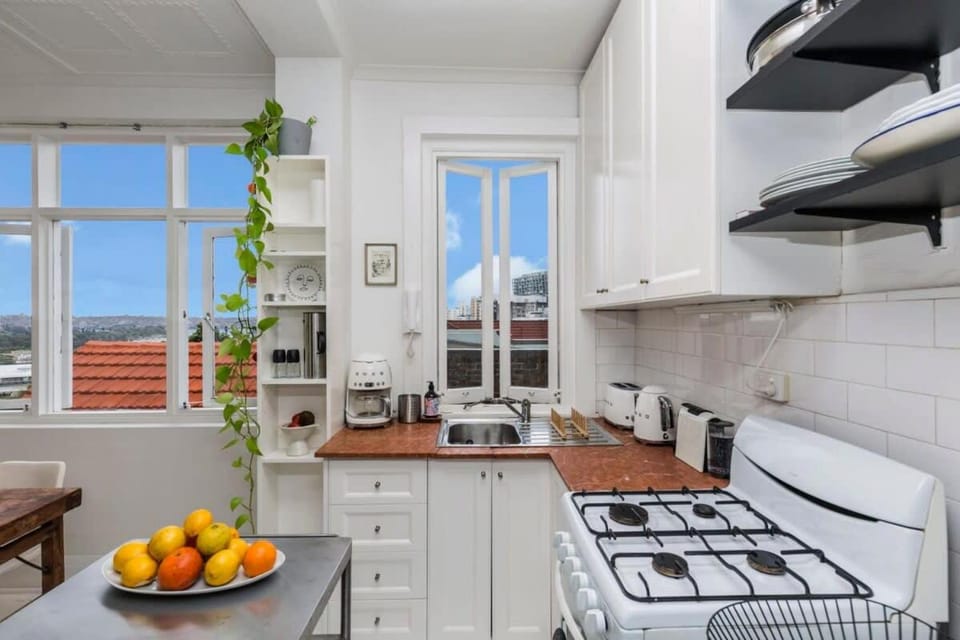 Kitchen or kitchenette, Dining area, dishwasher, stove, toaster