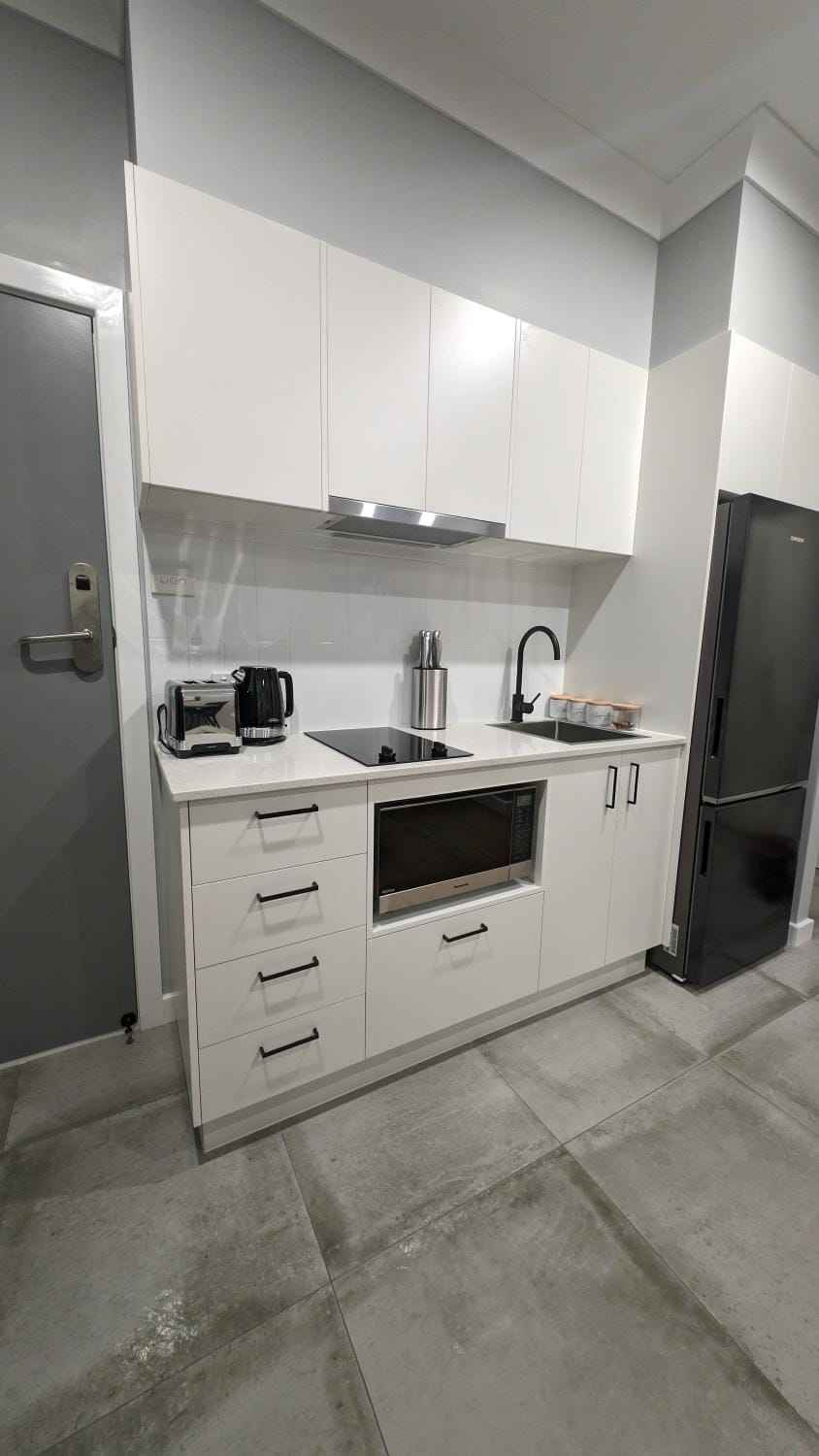 Kitchen or kitchenette, stove, toaster