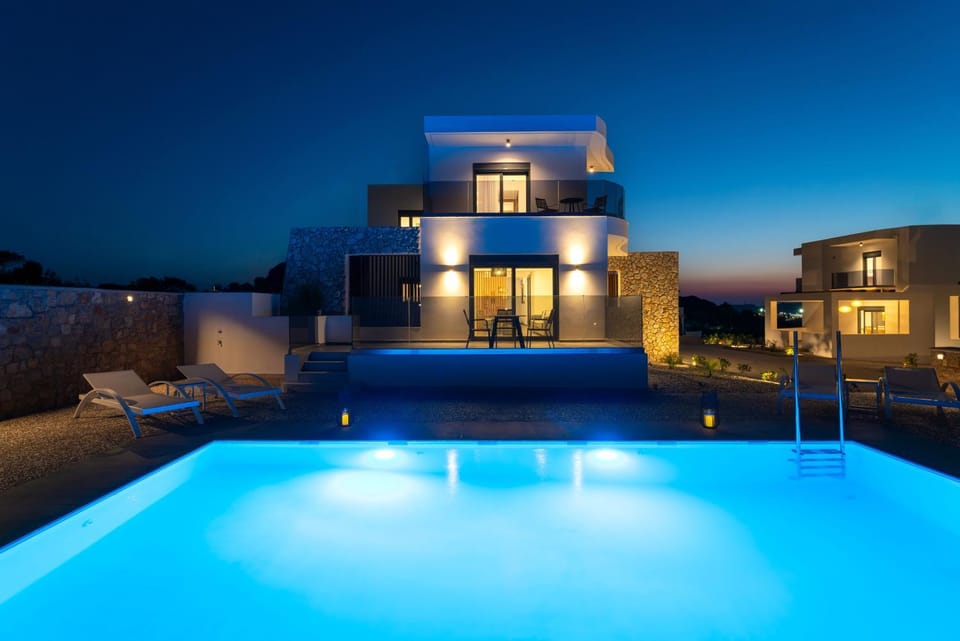 Property building, Patio, Night, Pool view, Swimming pool, sunbed