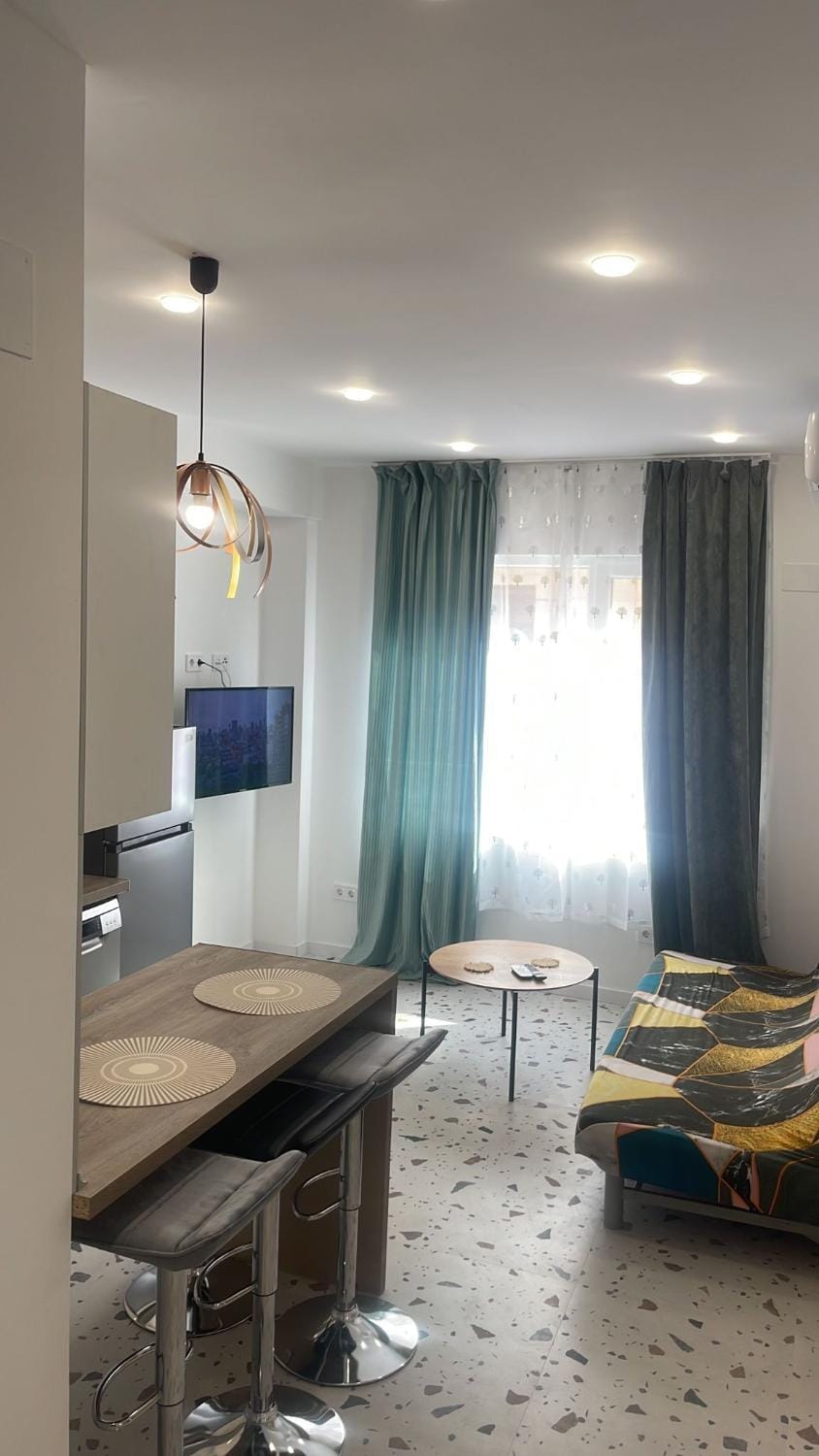 TV and multimedia, Kitchen or kitchenette, Living room, Seating area, Dining area