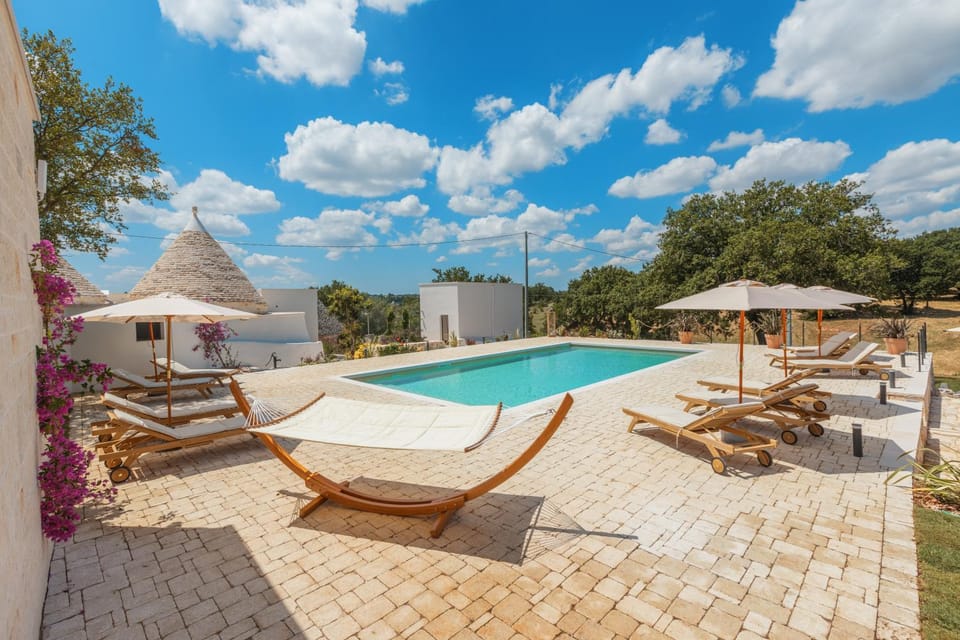 Property building, Living room, Swimming pool