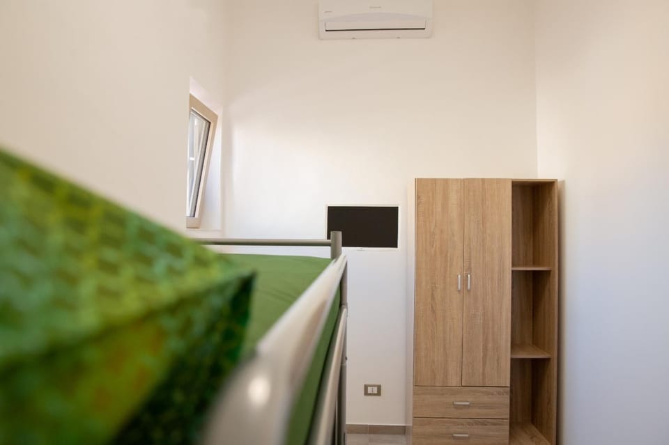 Photo of the whole room, hair dresser, wardrobe, air conditioner